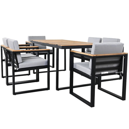 7-Piece outdoor dining set by Unique Piece Furniture with black frame and gray cushions on Tampa Home & Garden Store