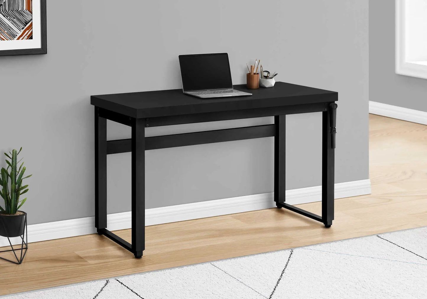 Computer desk by Unique Piece Furniture, black frame, adjustable standing desk with laptop on Tampa Home & Garden Store