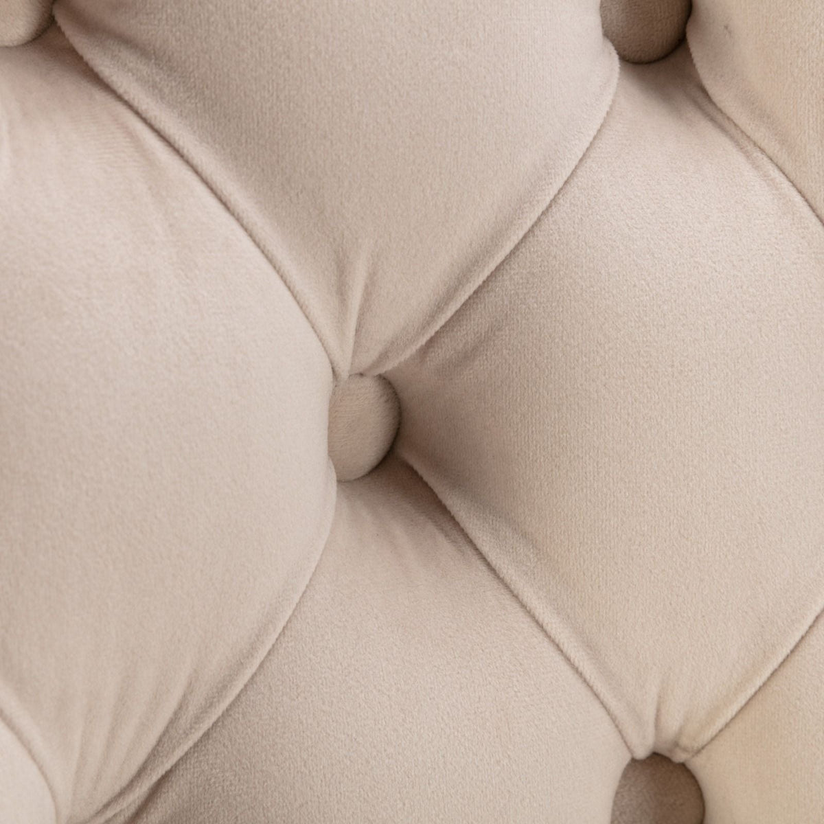 Beige velvet tufted upholstery close-up on sofa surface on Tampa Home & Garden Store