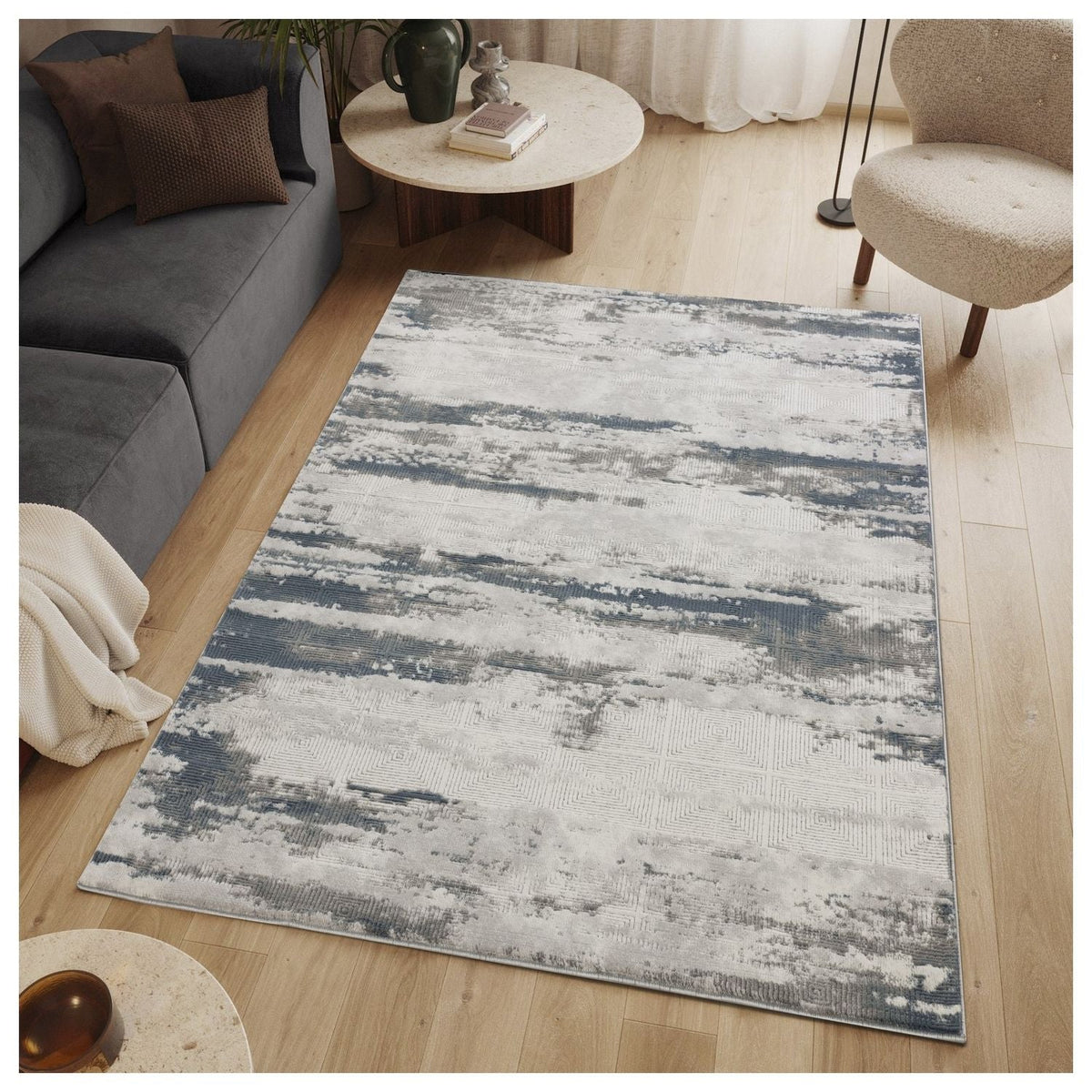 Contemporary gray area rug by HouseOfZazla with a subtle 3D abstract pattern on Tampa Home & Garden Store