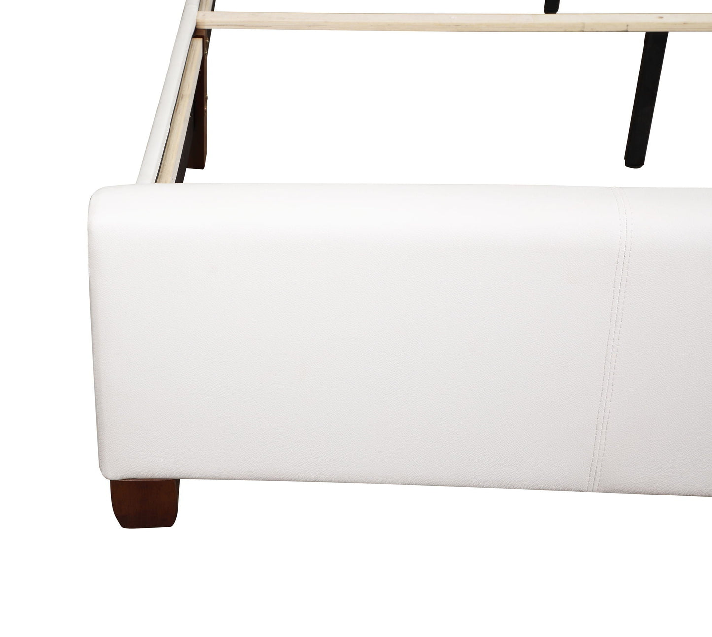Tufted upholstered bed in white faux leather with light wood legs on Tampa Home & Garden Store