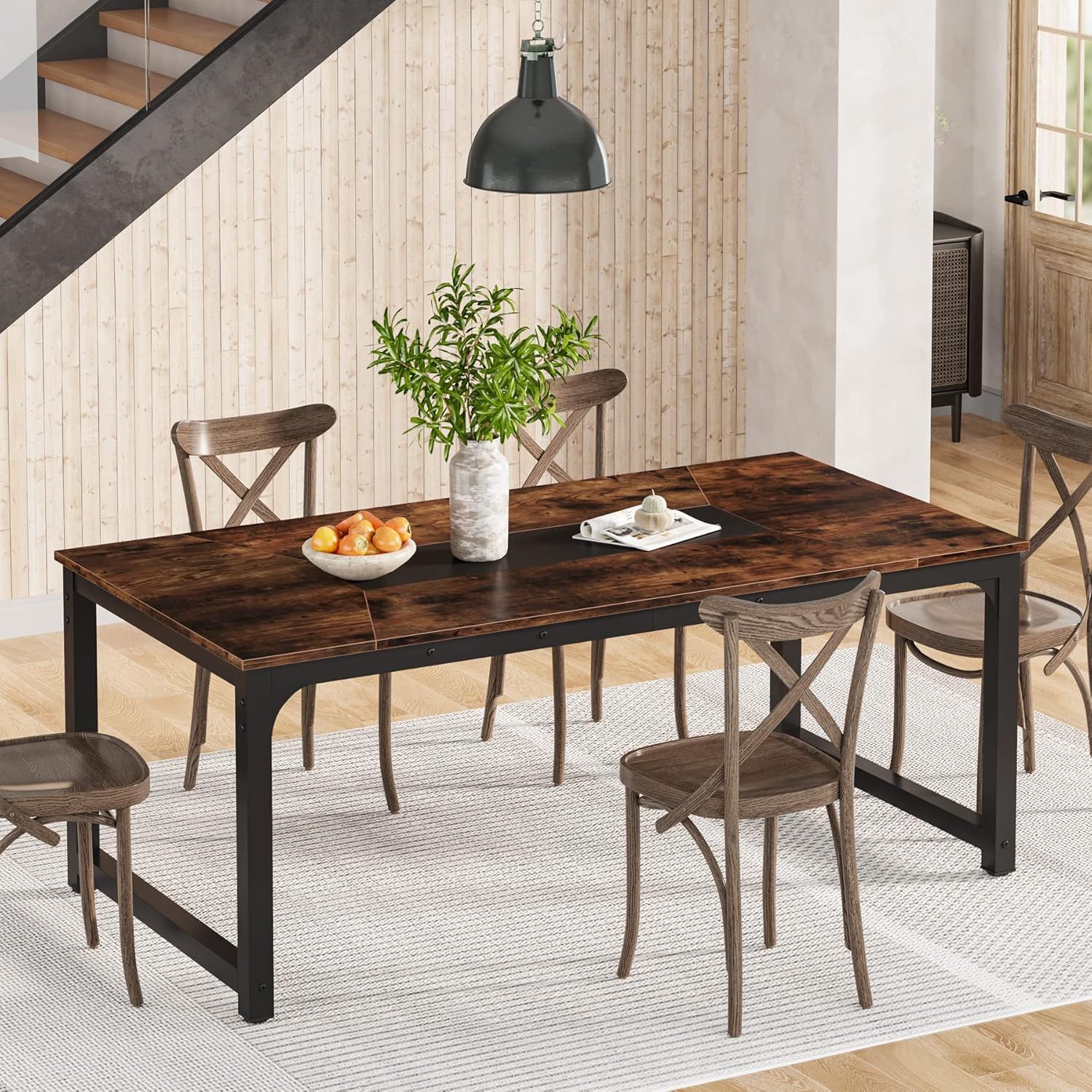 Rectangular dining table with brown wood top and black metal legs, crossback chairs on Tampa Home & Garden Store