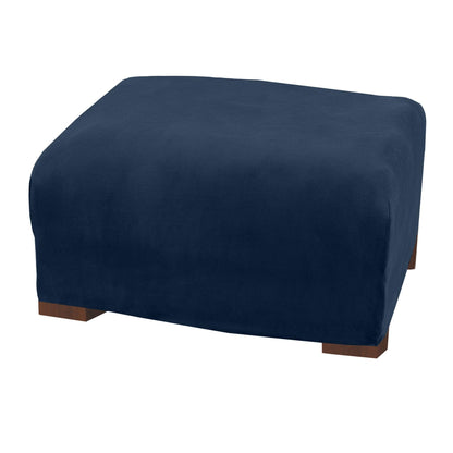 Velvet stretch slipcover Gale Collection navy blue by Great Bay Home on bed on Tampa Home & Garden Store
