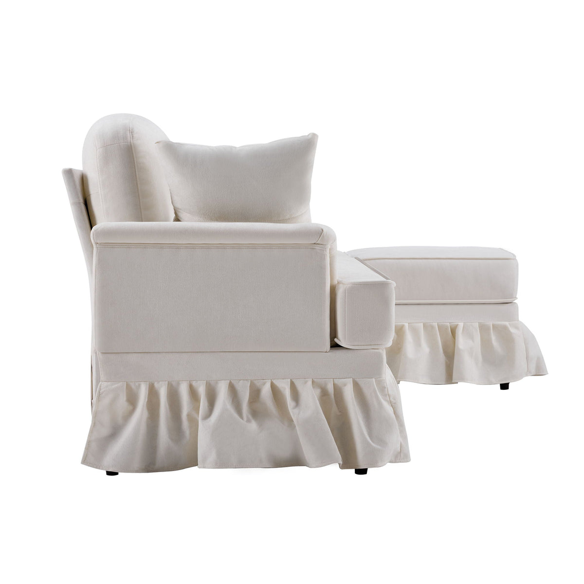 White L-shaped sectional sofa with removable ruffled skirt and flared arms, ottoman on Tampa Home & Garden Store