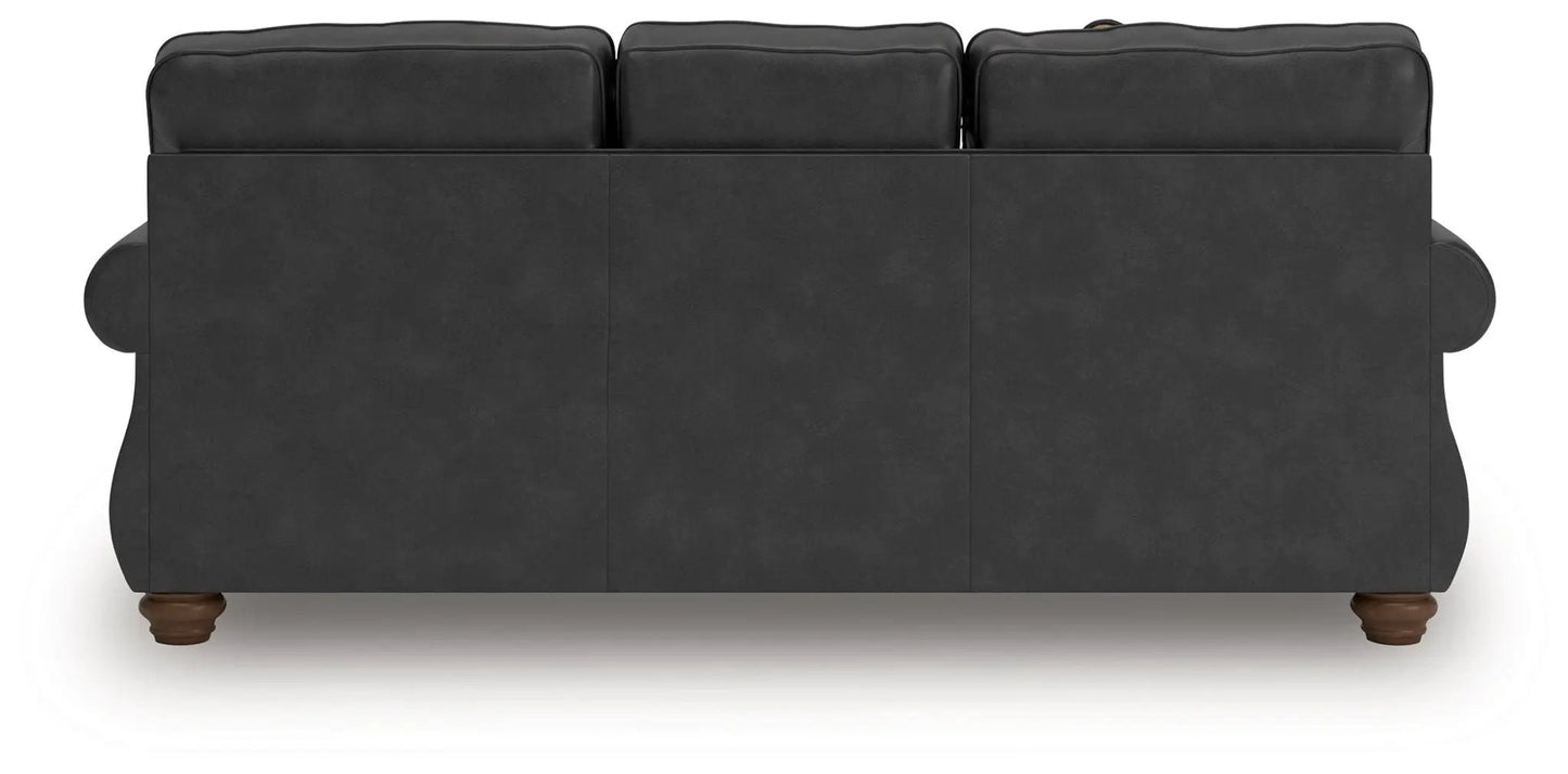 Chasemore sofa by Unique Piece Furniture, charcoal gray faux leather upholstery, back view on Tampa Home & Garden Store