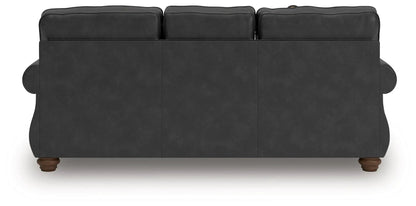 Chasemore sofa by Unique Piece Furniture, charcoal gray faux leather upholstery, back view on Tampa Home & Garden Store