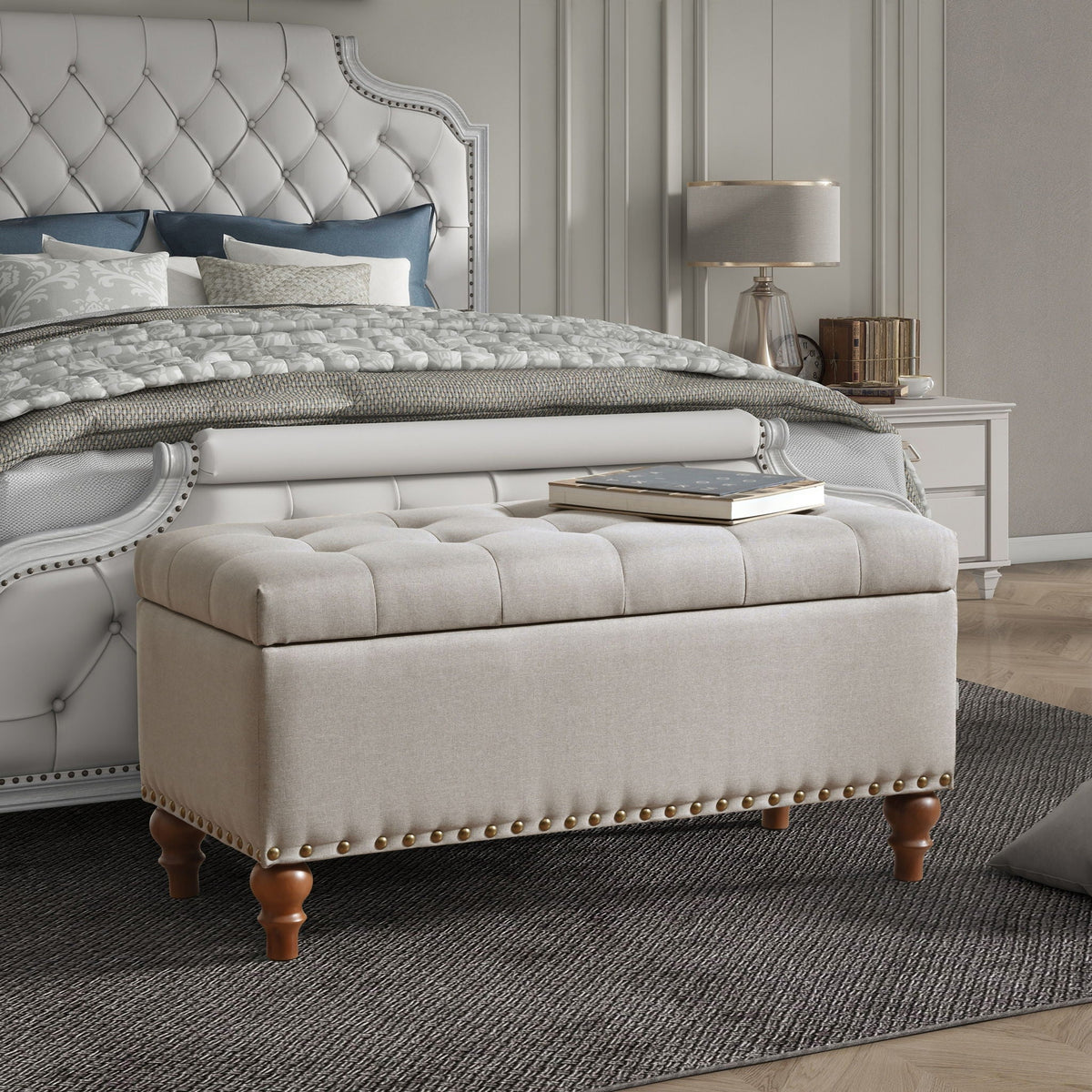 Upholstered storage ottoman with rivet trim in beige fabric by HouseOfZazla on Tampa Home & Garden Store