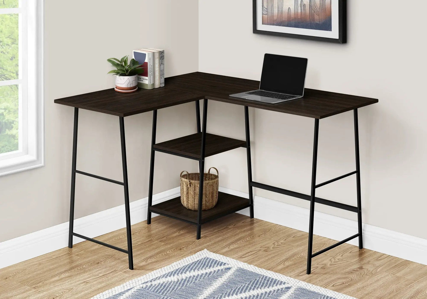 Corner computer desk with black legs, laptop on right, plant and books on left, basket on shelf on Tampa Home & Garden Store