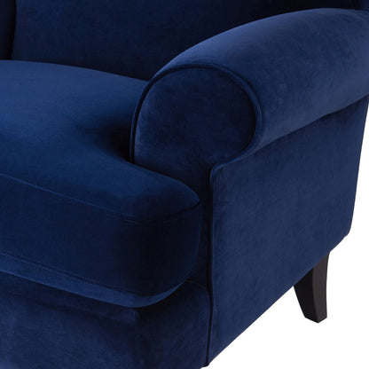 Accent Arm Chair in blue velvet with curved armrests and dark hardwood legs on Tampa Home & Garden Store