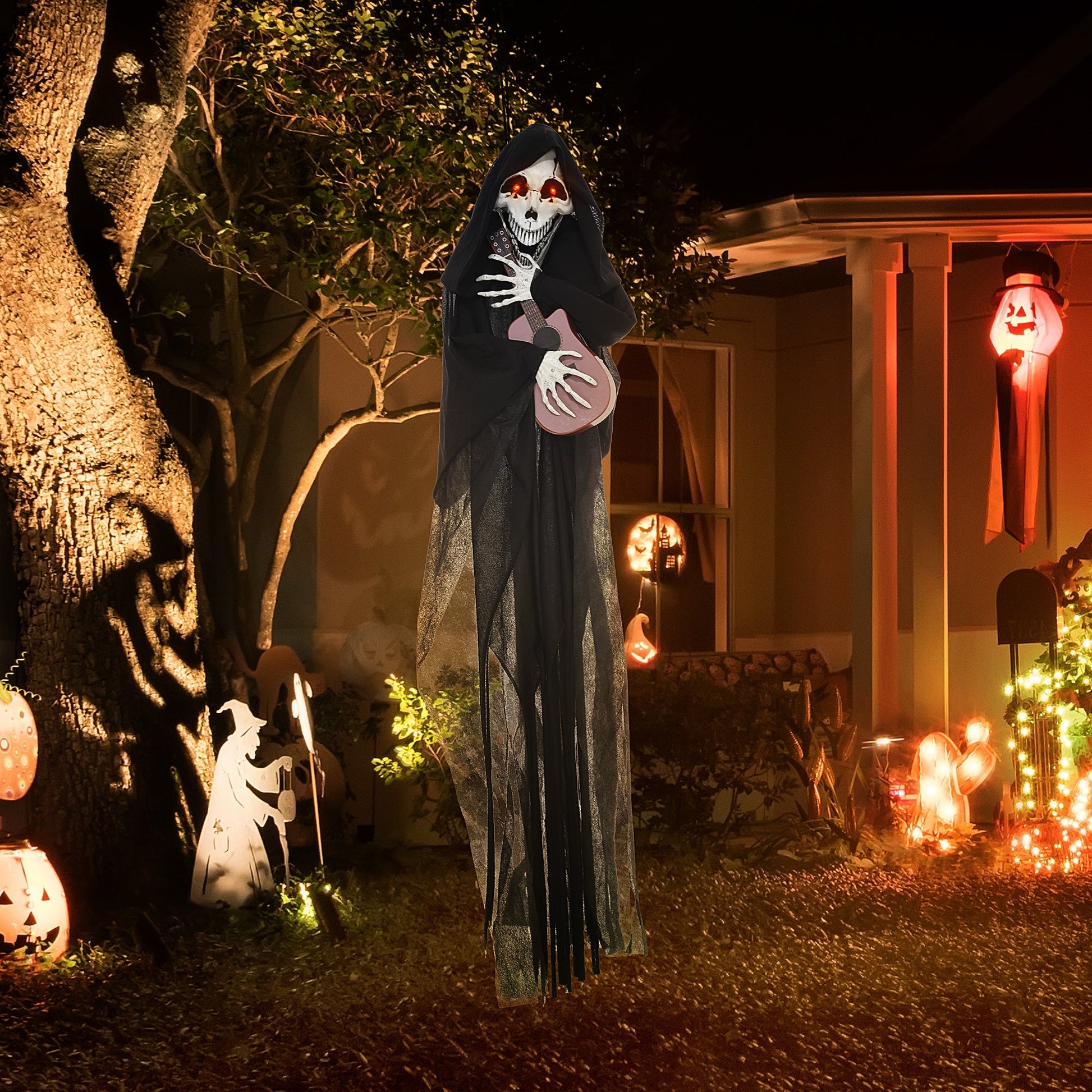 4.3' Animated Grim Reaper Guitarist with motion and sound activation holding guitar outside on Tampa Home & Garden Store