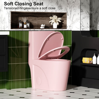 Pink porcelain one-piece toilet with open seat in a green-tiled bathroom on Tampa Home & Garden Store