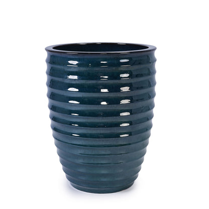 Flowerpot planter by HouseOfZazla in glossy dark blue ceramic with ribbed, wavy texture on Tampa Home & Garden Store