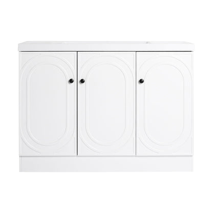 Freestanding white bath vanity with resin sink, three cabinet doors and black knobs on Tampa Home & Garden Store