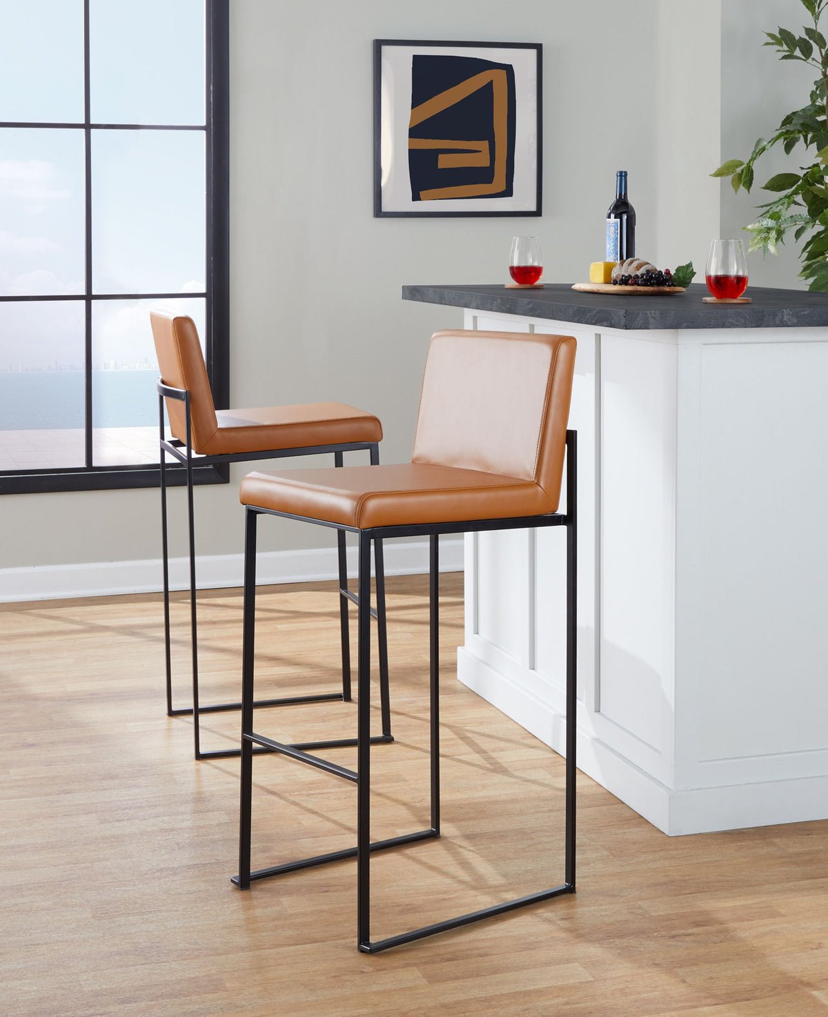 High-back barstool set in tan leather with black metal frames, 2 stools at kitchen island on Tampa Home & Garden Store