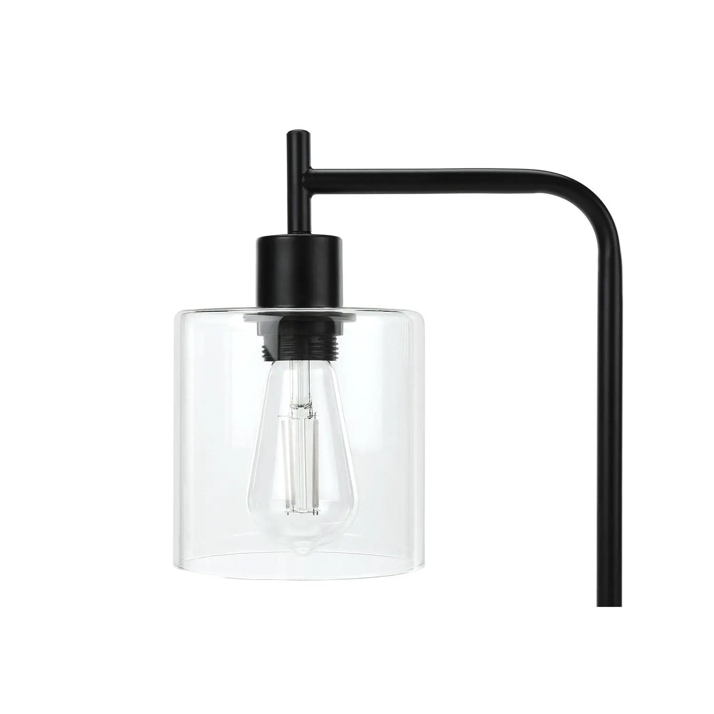 Table lamp with black metal frame and clear glass shade around a visible bulb on Tampa Home & Garden Store