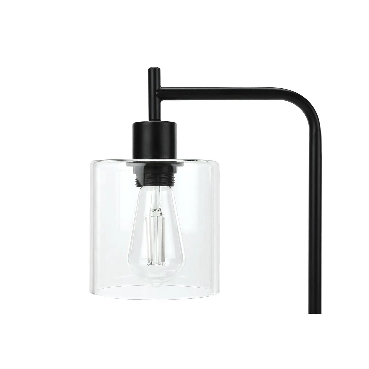 Table lamp with black metal frame and clear glass shade around a visible bulb on Tampa Home & Garden Store