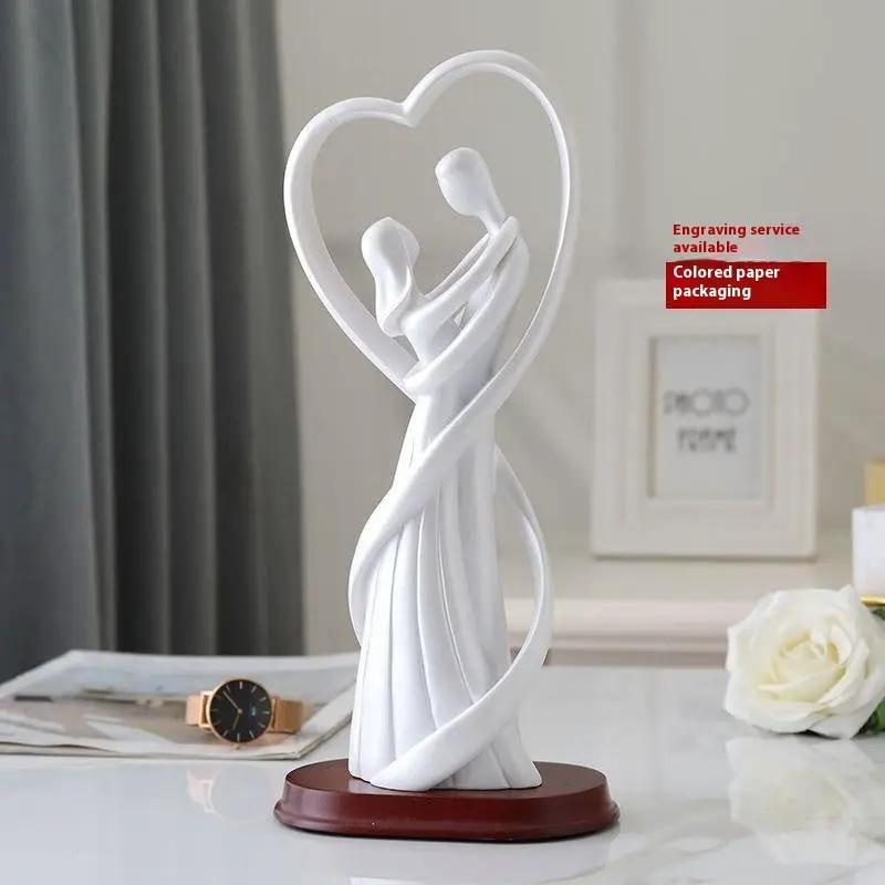 White heart-shaped lovers statue with intertwined figures on wooden base, FLIPSTYLEZLLC on Tampa Home & Garden Store