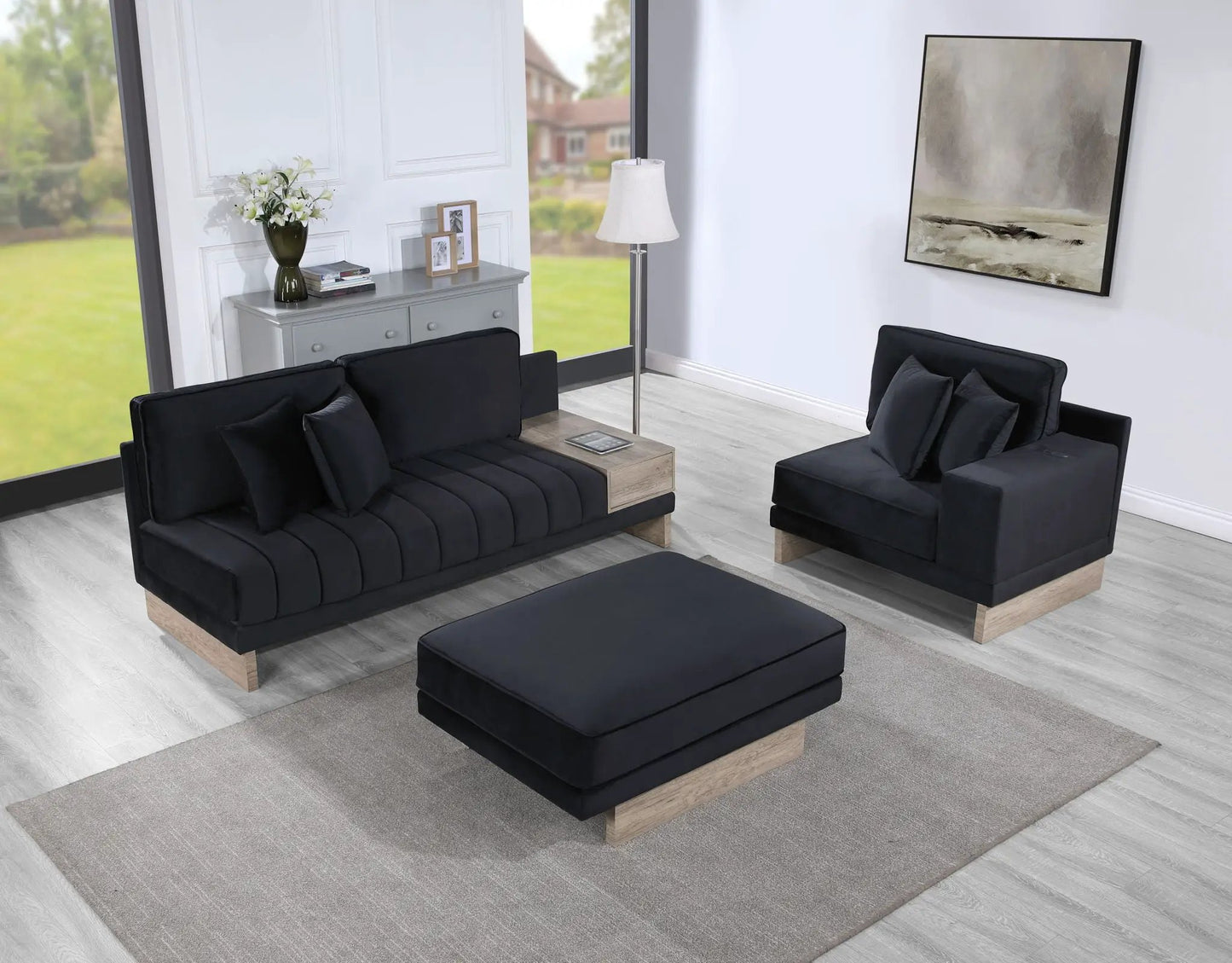 Memphis reversible sectional with black fabric upholstery and light wood base ottoman on Tampa Home & Garden Store
