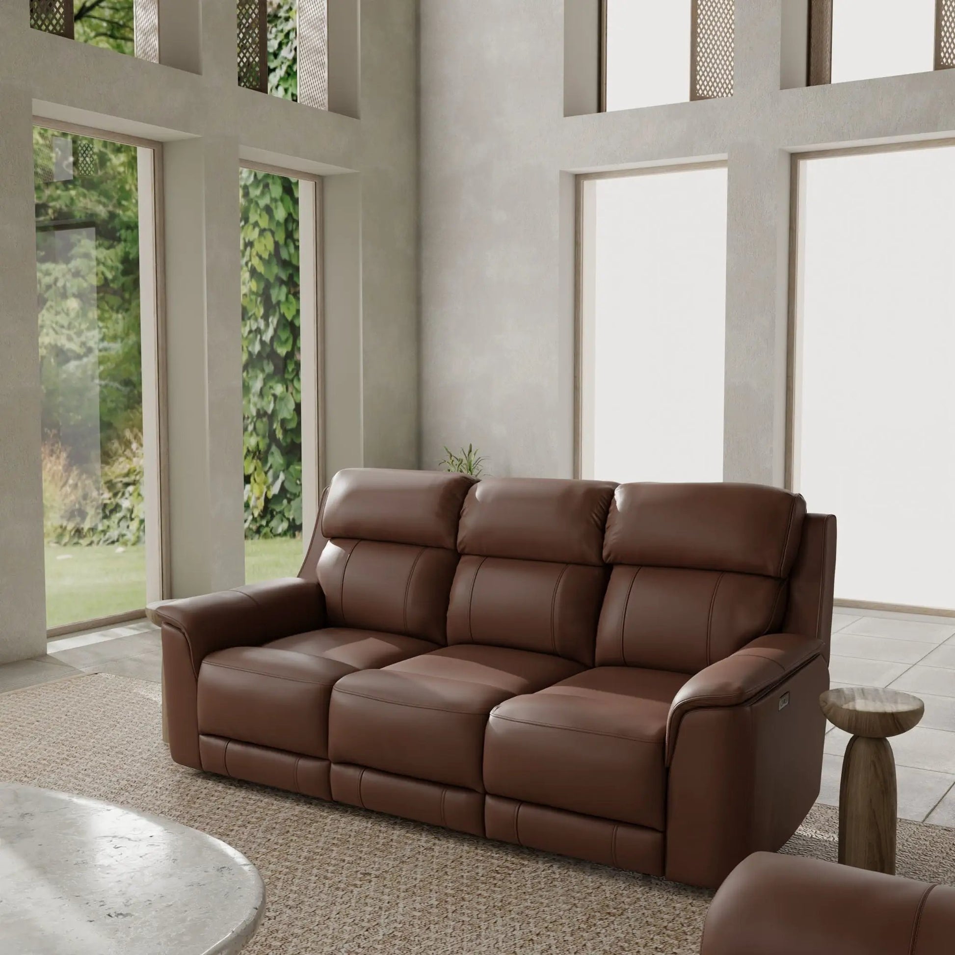 Oslo dual power reclining sofa in brown leather with plush cushions on Tampa Home & Garden Store