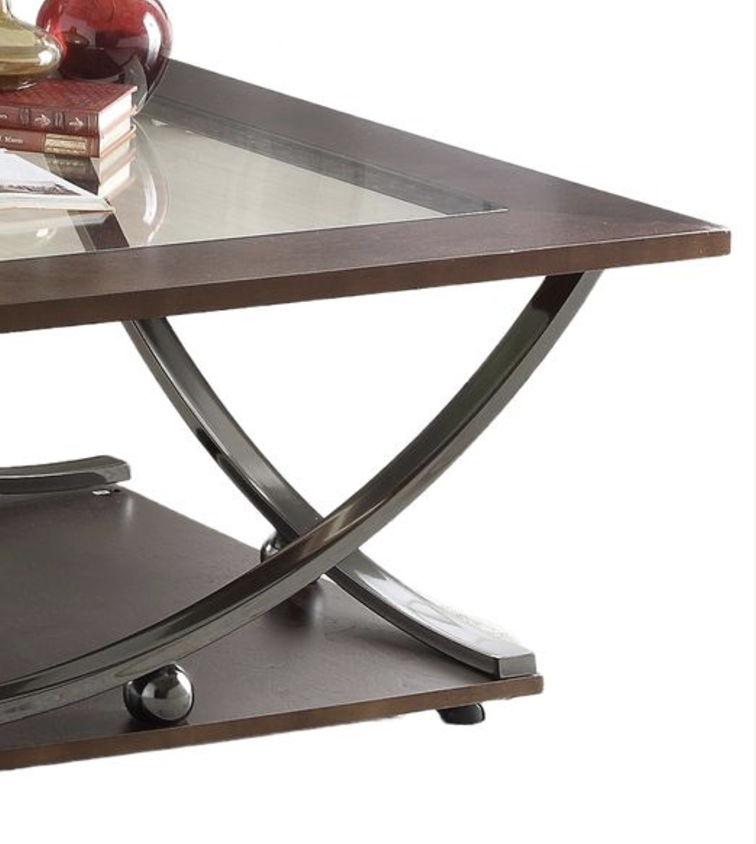 Isiah coffee table with glass inset, dark wood frame and curved metal X-frame on Tampa Home & Garden Store