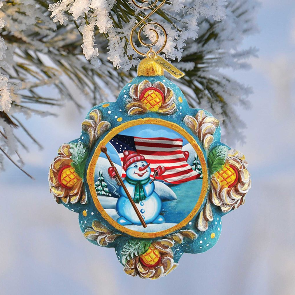 Patriotic snowman sculpted ornament by G. DeBrekht with turquoise frame pinecone accents on Tampa Home & Garden Store
