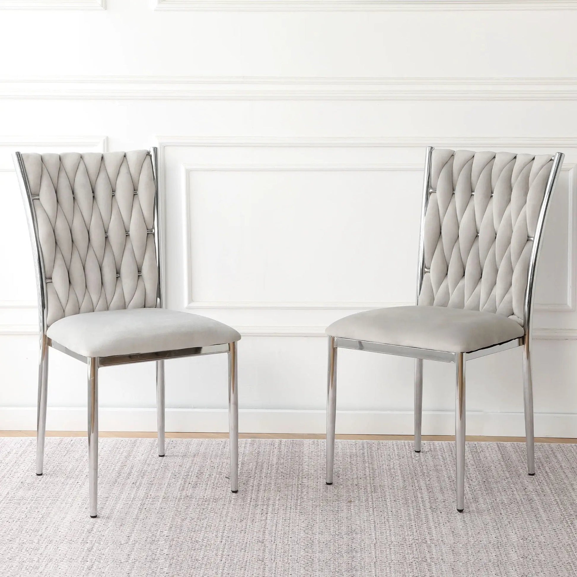 Modern dining chair set by Unique Piece Furniture, two tufted gray chairs with chrome legs on Tampa Home & Garden Store