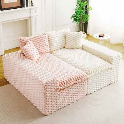 Multifunctional sofa with pink and cream chunky knit covers in lounge by Unique Piece Furniture on Tampa Home & Garden Store