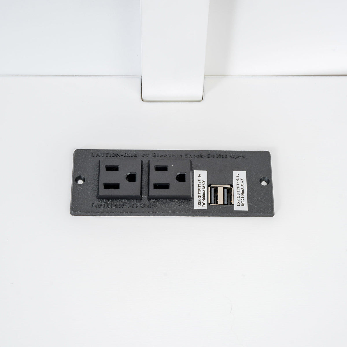 Electrical outlet panel with USB ports and switches mounted on a white wall on Tampa Home & Garden Store