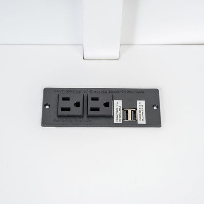 Electrical outlet panel with USB ports and switches mounted on a white wall on Tampa Home & Garden Store