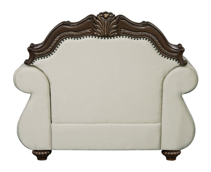 Pierce Chair With Pillow beige upholstery on dark cherry carved wood frame nailhead trim on Tampa Home & Garden Store