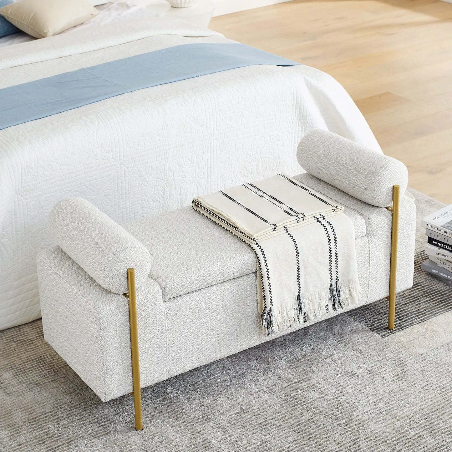 Elegant upholstered storage bench cream fabric with cylindrical arms and gold iron legs on Tampa Home & Garden Store