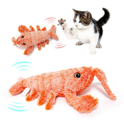 Orange plush shrimp cat toy with USB charging and jumping action for cats by Sell My Stuff on Tampa Home & Garden Store