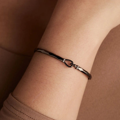 Faceted Hook Tension Bracelet by ALEX AND ANI in dark metal with crystal accents on wrist on Tampa Home & Garden Store