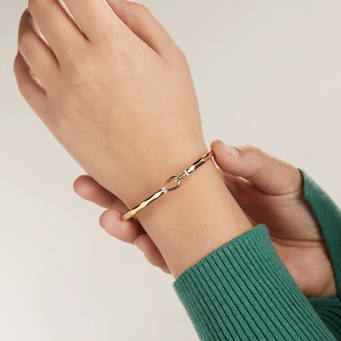 Faceted Hook Tension Bracelet by ALEX AND ANI in gold-tone with curved band on Tampa Home & Garden Store