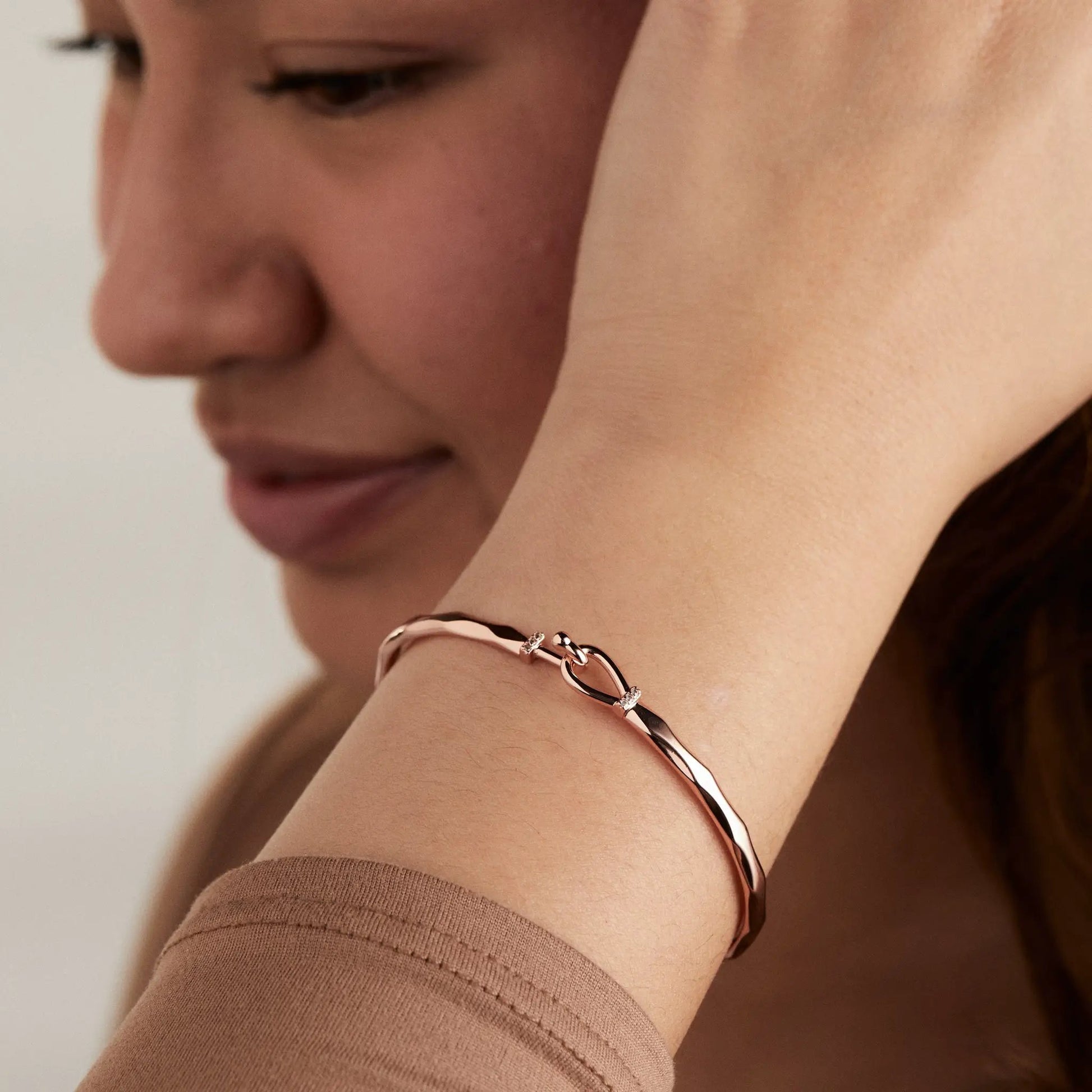 Faceted Hook Tension Bracelet by ALEX AND ANI in rose gold tone on wrist on Tampa Home & Garden Store