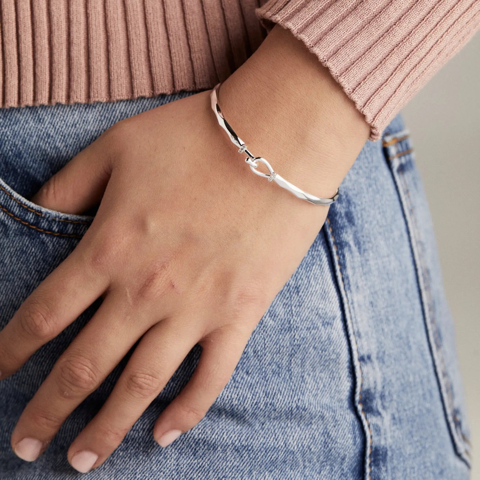 Faceted Hook Tension Bracelet silver-tone metal on wrist by Alex and Ani on Tampa Home & Garden Store