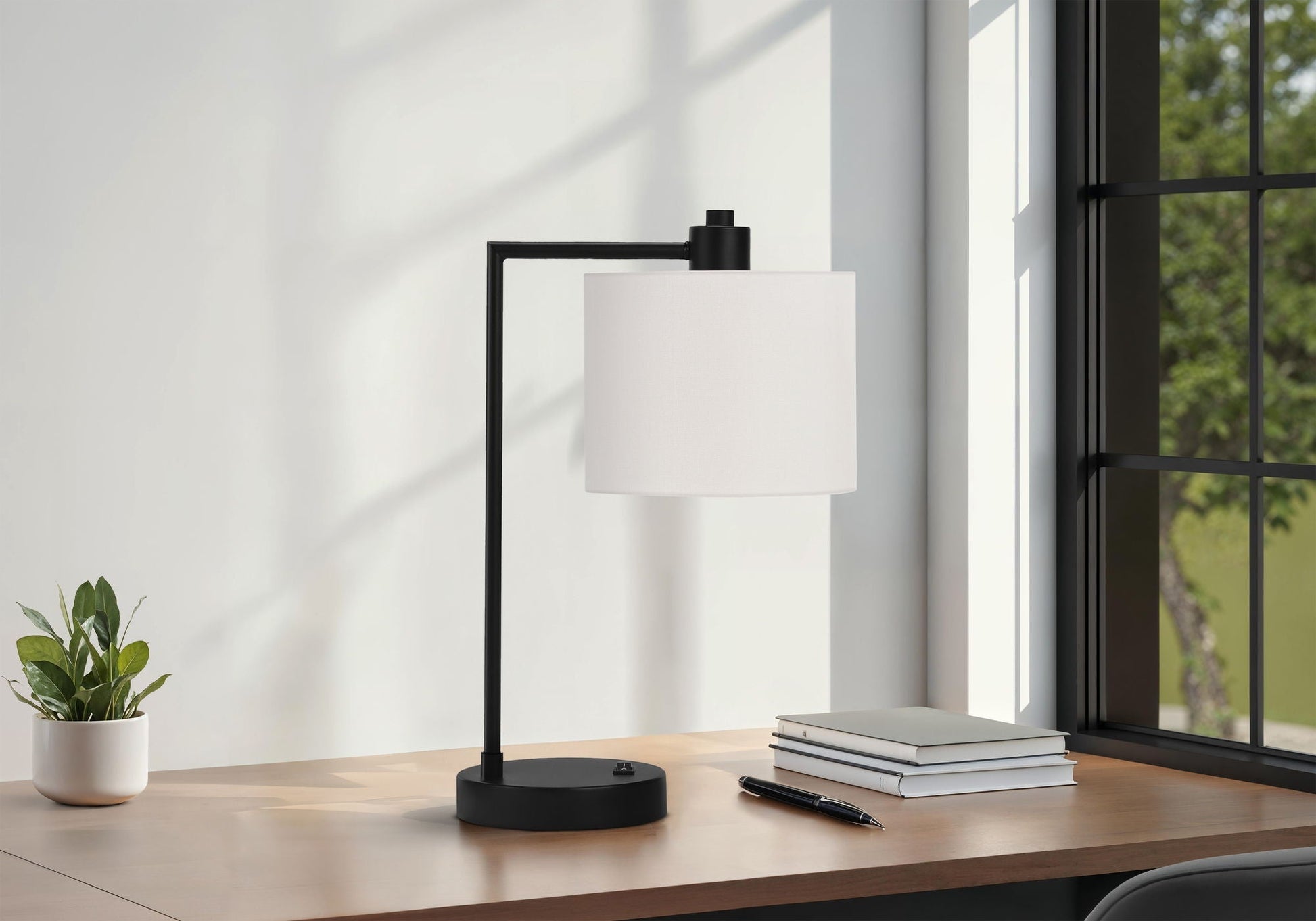 Lighting table lamp with USB port, black metal frame and cream drum shade on Tampa Home & Garden Store