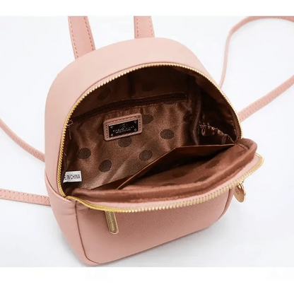 Pink mini soft-touch leather backpack by Stevvex with gold zipper and brown polka-dot lining on Tampa Home & Garden Store