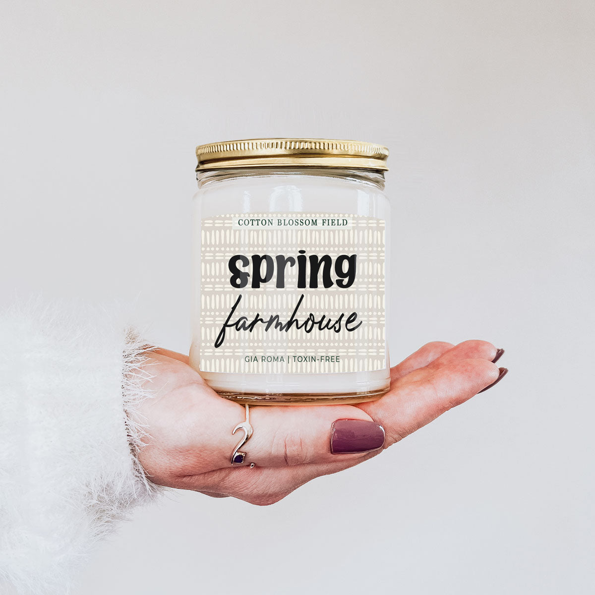 Cotton Blossom Candle Gia Roma in glass jar with gold lid, farmhouse label on Tampa Home & Garden Store