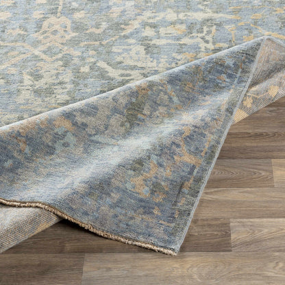 Farmingville Area Rug blue-gray palette with beige accents, soft textured with fringed edges on Tampa Home & Garden Store