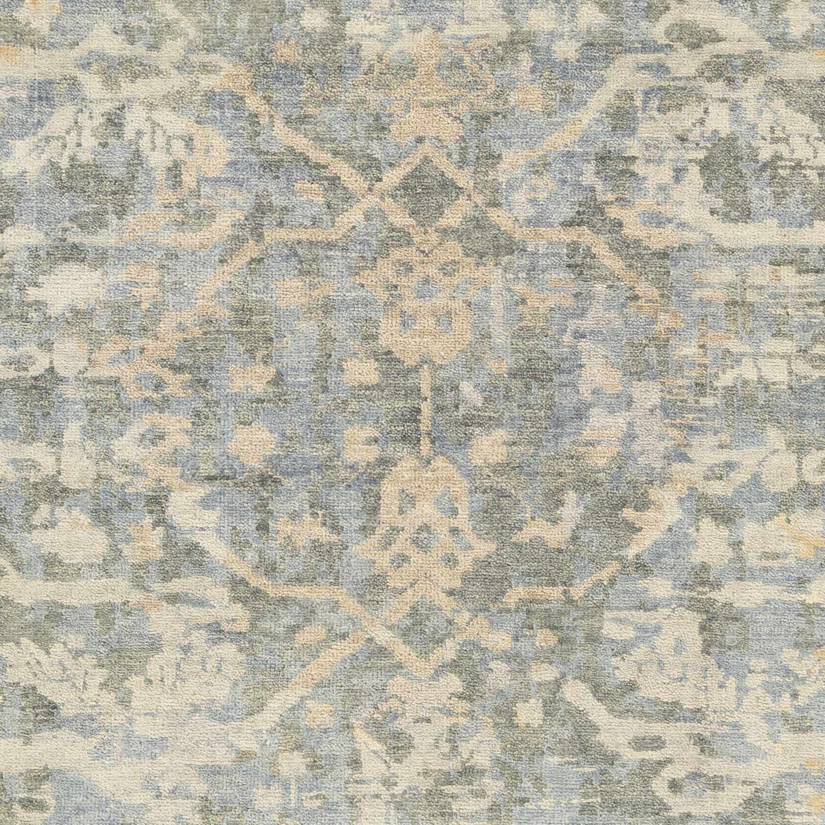 Farmingville Area Rug by Boutique Rugs, distressed blue-gray beige palette on Tampa Home & Garden Store