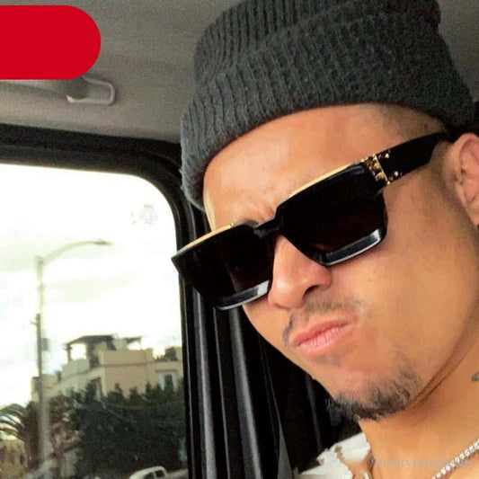 Stevvex black square sunglasses worn by man in car with knit beanie driving eyewear on Tampa Home & Garden Store