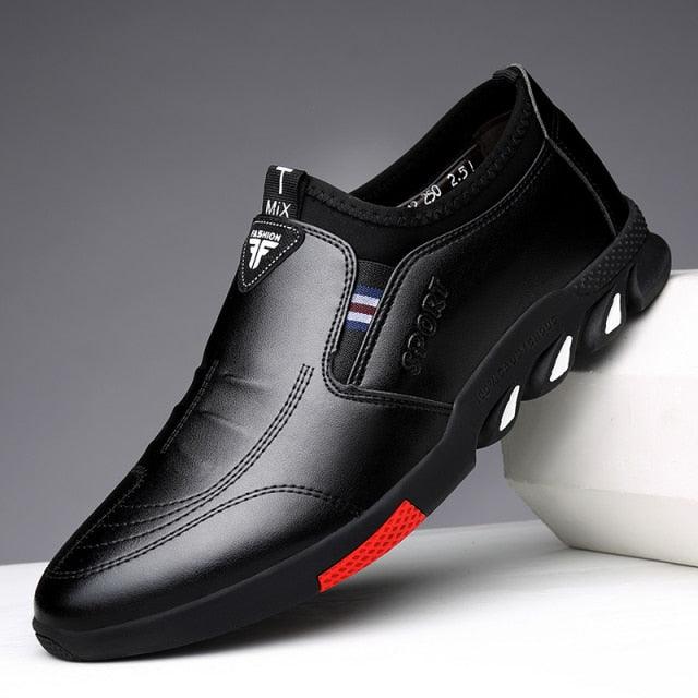 Black leather men's casual sneakers Stevvex slip-on with red outsole accent for walking on Tampa Home & Garden Store