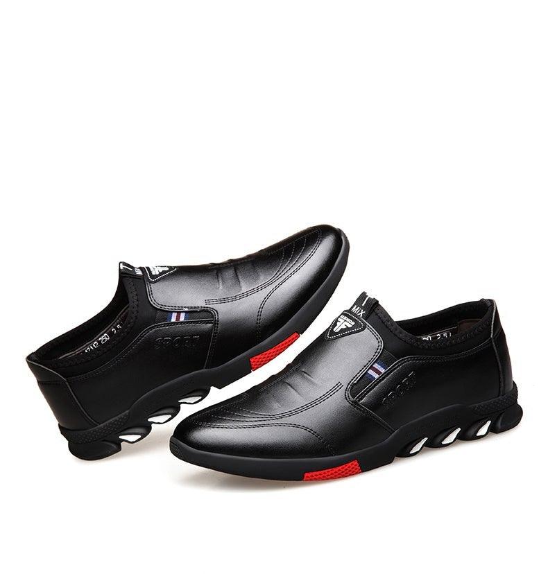 Stevvex black leather men's casual slip-on sneakers pair with white sole and red accents on Tampa Home & Garden Store