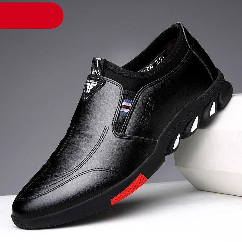 Stevvex men's black leather slip-on sneakers with red outsole accent on Tampa Home & Garden Store