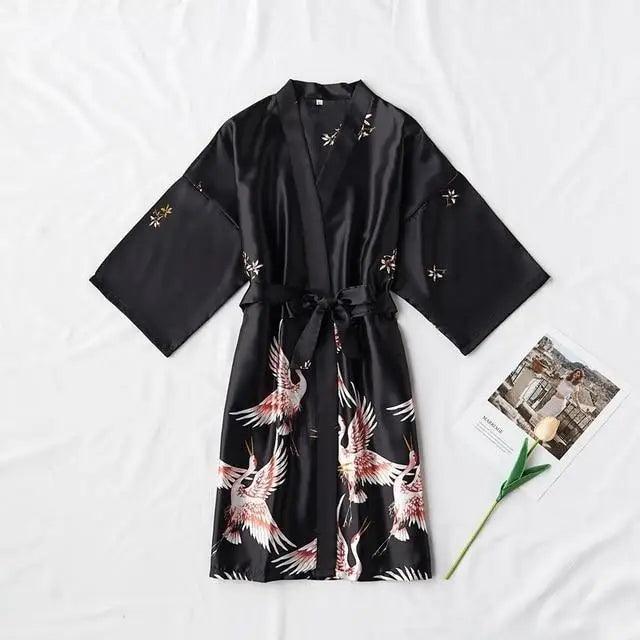 Kimono-style black satin robe for women with crane bird print, belt tied waist, long sleeves on Tampa Home & Garden Store