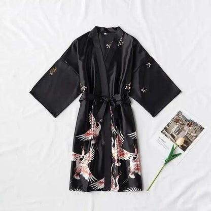 Kimono-style black satin robe for women with crane bird print, belt tied waist, long sleeves on Tampa Home & Garden Store