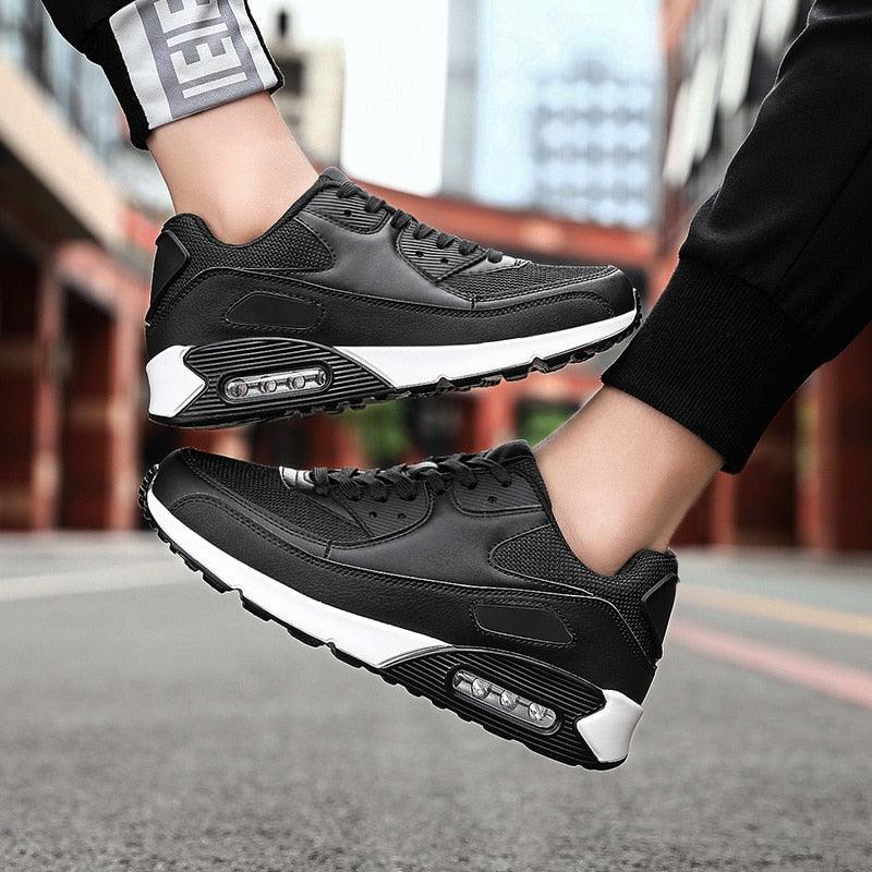 Stevvex athletic shoes black lace-up sneakers with white sole and visible air unit, pair on Tampa Home & Garden Store