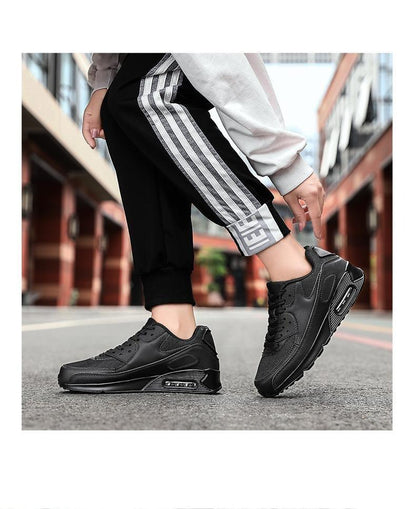 Stevvex black lace-up unisex athletic running shoes pair, breathable mesh upper on Tampa Home & Garden Store