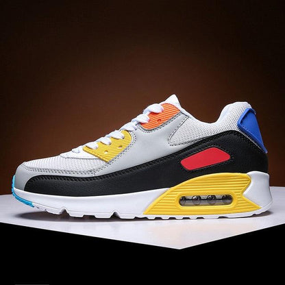 Stevvex athletic shoes white mesh with black overlay, yellow accents and blue heel tab sole on Tampa Home & Garden Store